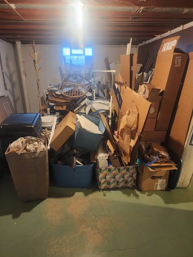 Roll-off dumpster container at job site for 2 Yard Dumpster Rental in Simonton Lake